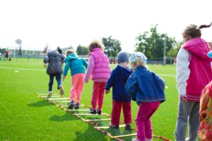 Children Playing on the School Field