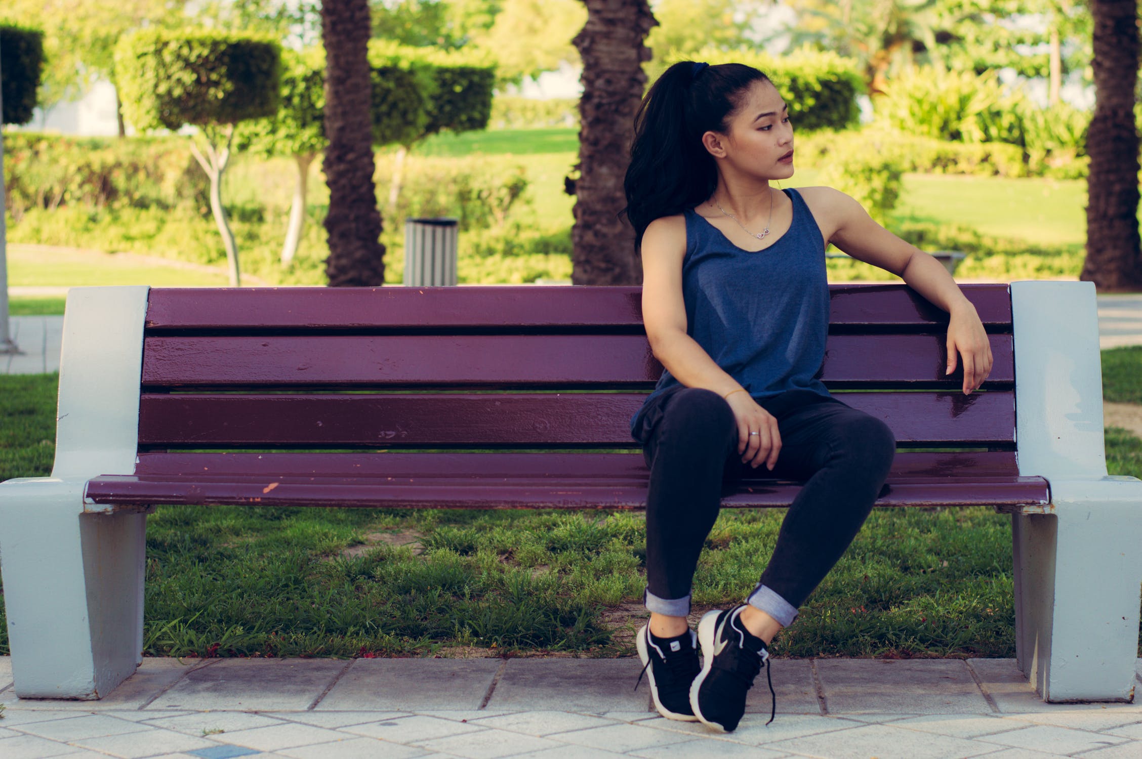 Woman sitting on a park bench