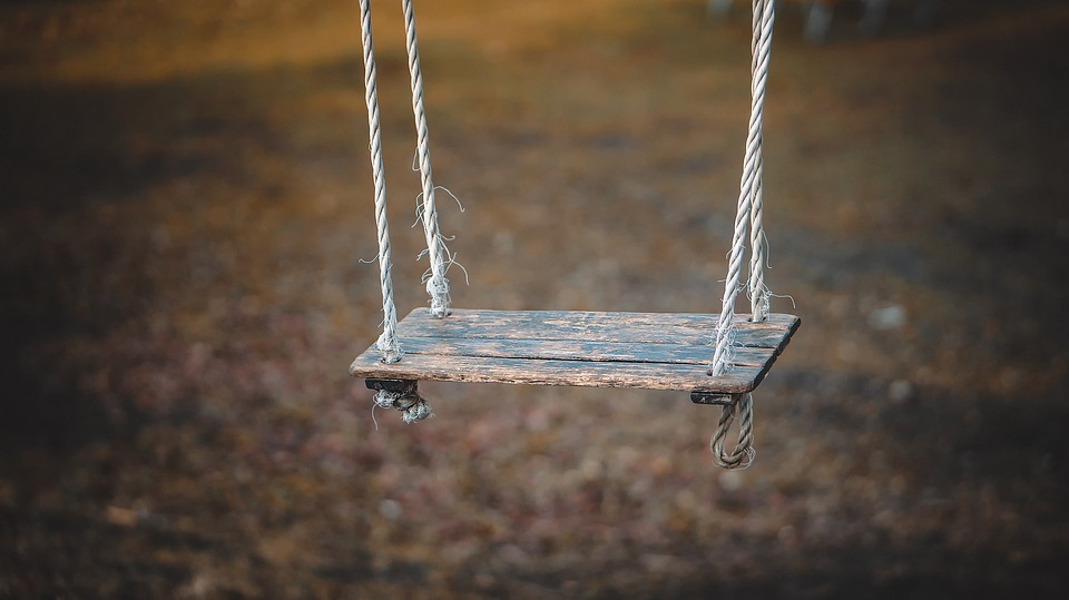 Empty swing in playground