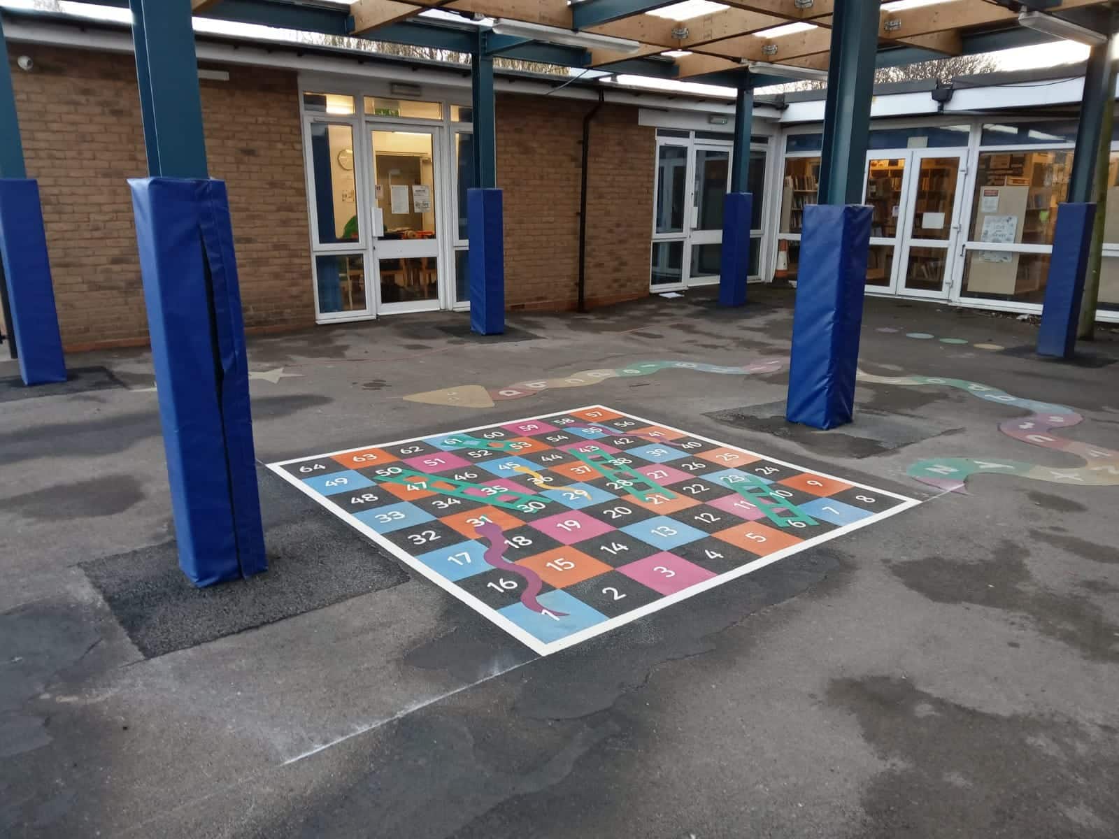 checkerboard playground markings with alternating colours and numbers