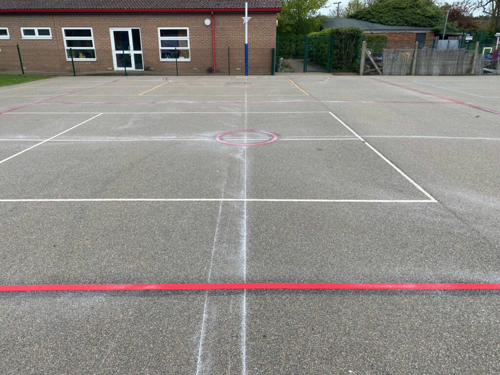 netball court playground markings, point of view from goal end.